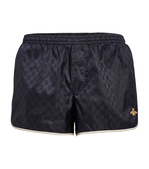 mens bee shorts gucci|Gucci shopping bags.